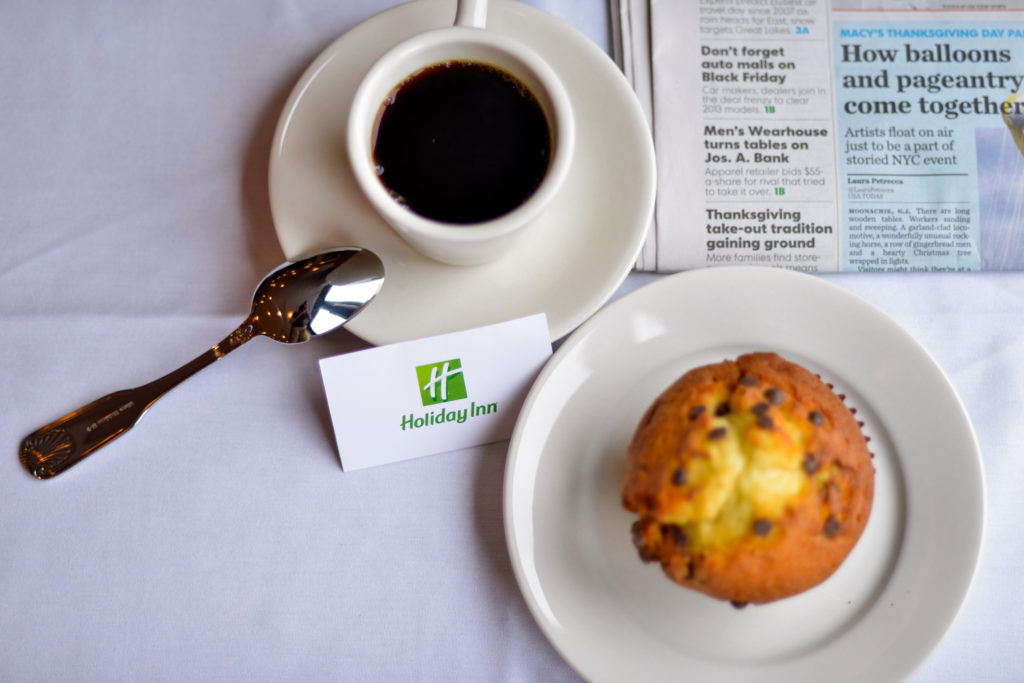 Holiday Inn New York JFK Airport Area coffee, muffin, and newspaper