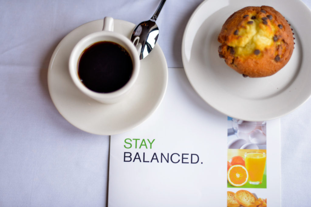 Holiday Inn New York JFK Airport Area coffee, muffin, and menu