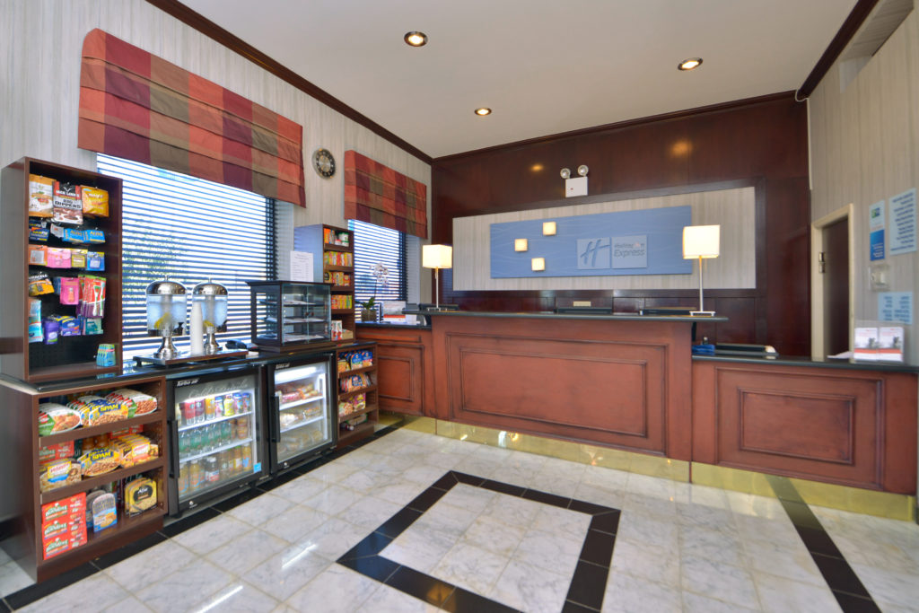 Holiday Inn Express New York JFK Airport Area front desk and convenience store