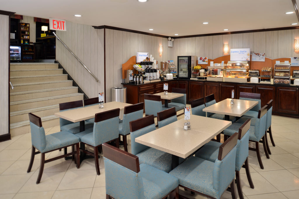 Holiday Inn Express New York JFK Airport Area Express Start breakfast bar with seating