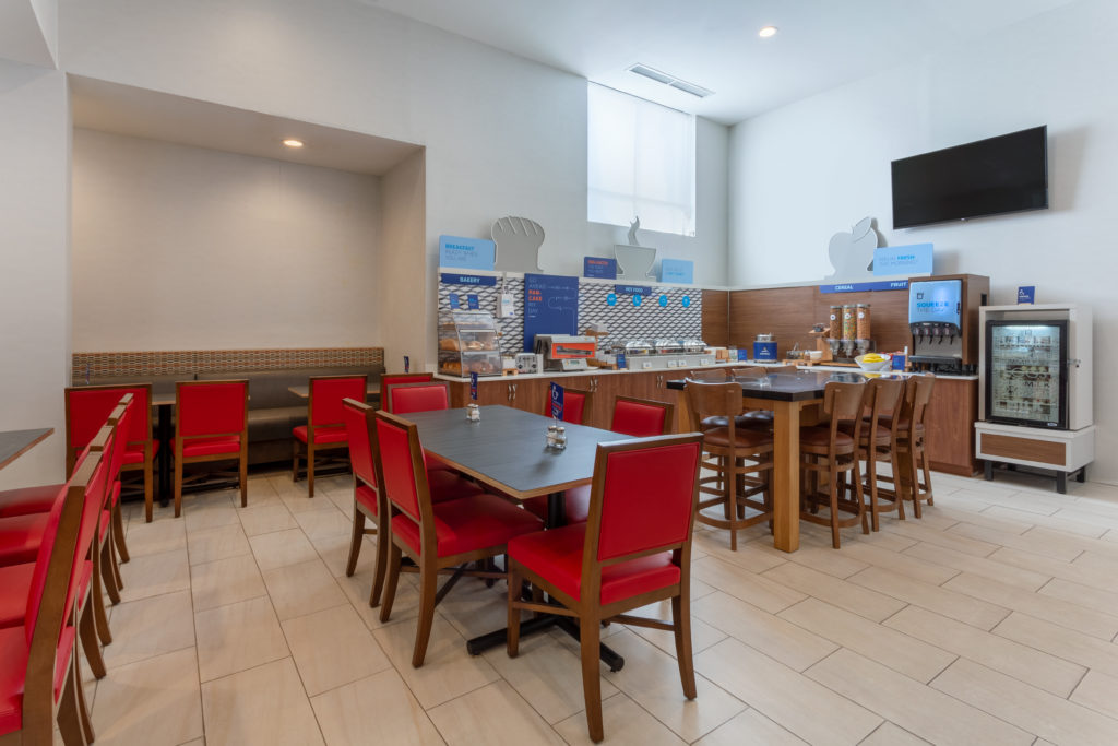 Holiday Inn Express LaGuardia Airport breakfast bar with seating