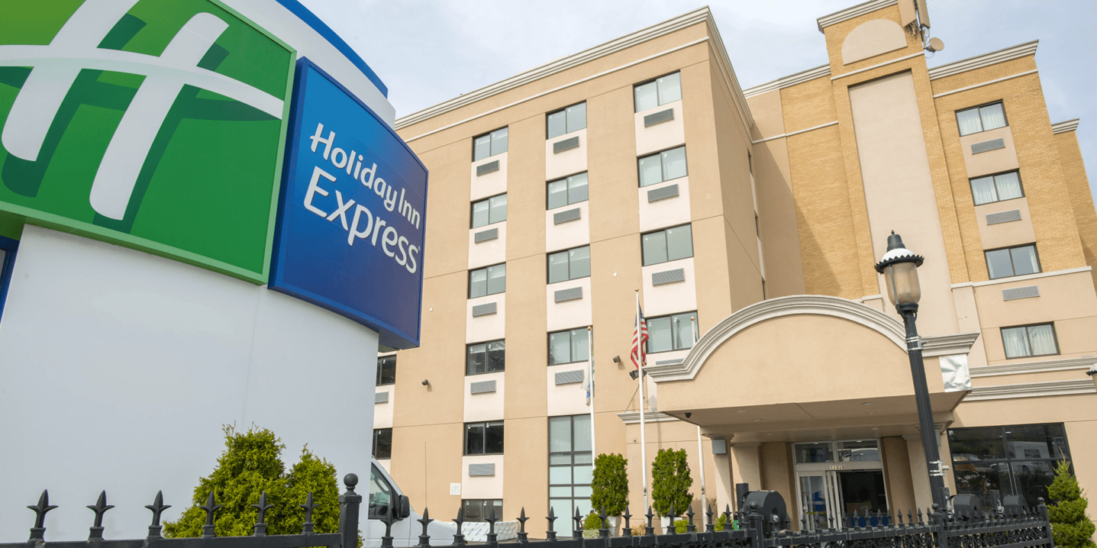 Holiday Inn Express LaGuardia Airport exterior and sign